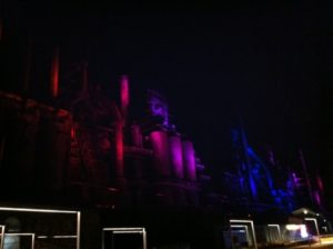 Steel stacks at night with lights