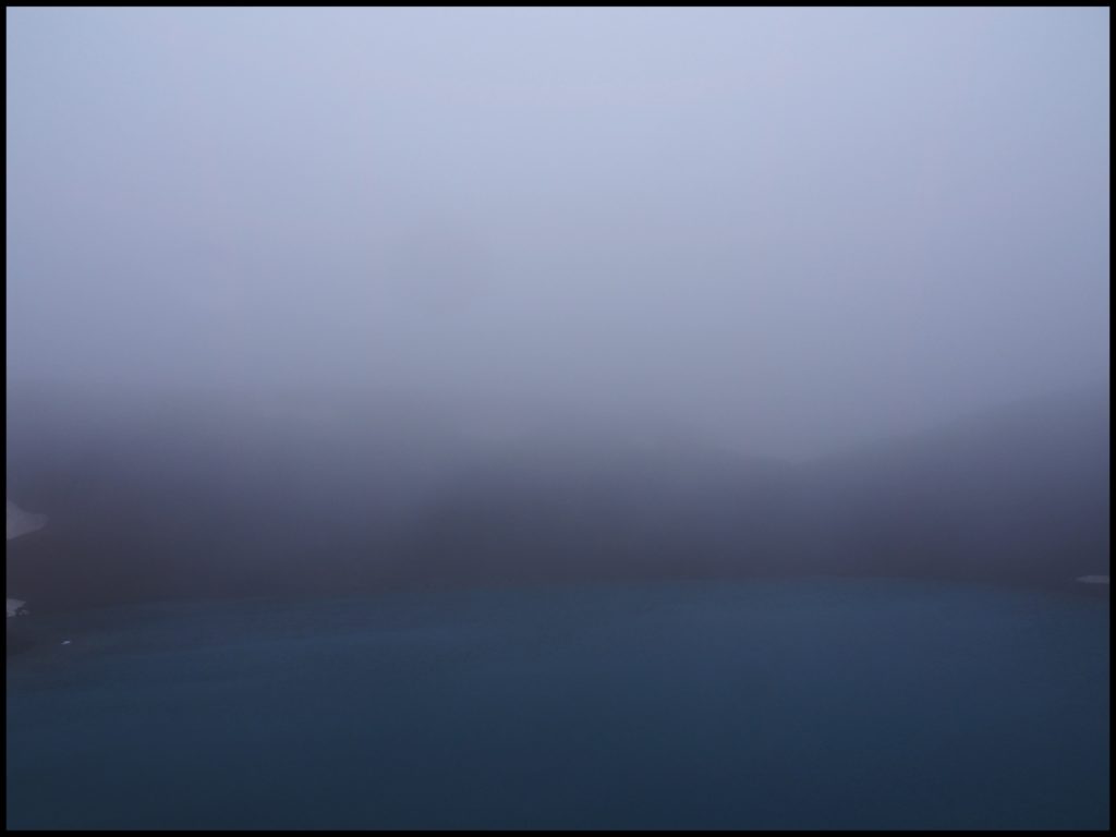 Cloud mist covering lake