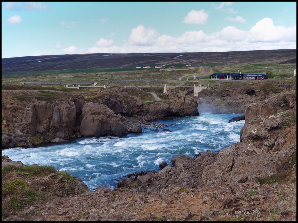 Godafoss waterfalls flowing blue hue