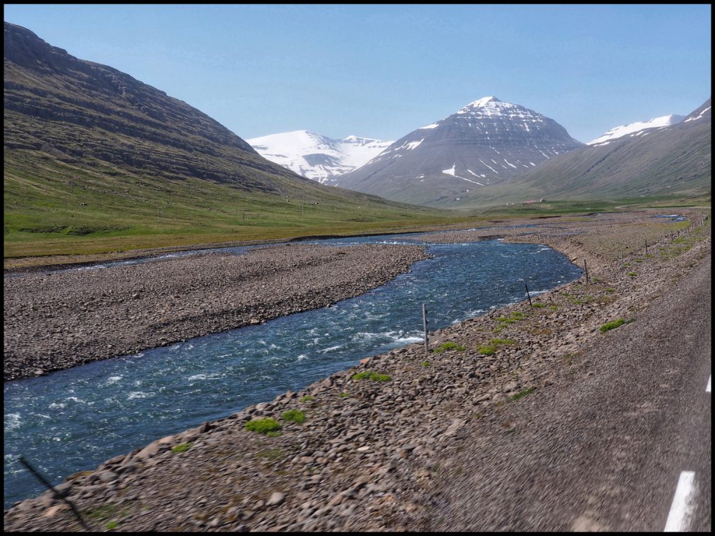 Snow covered mountain and river