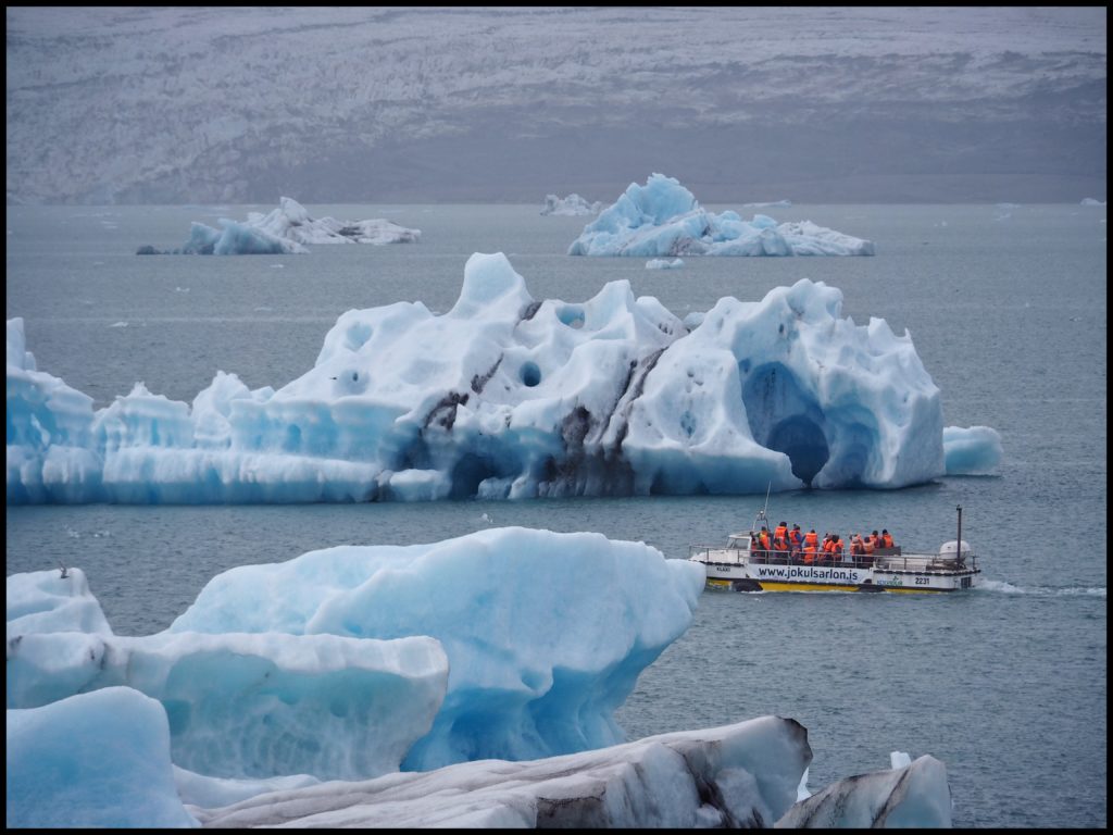 Boat crazing around Icebergs