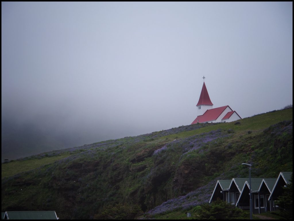 Church in mountain in clouds