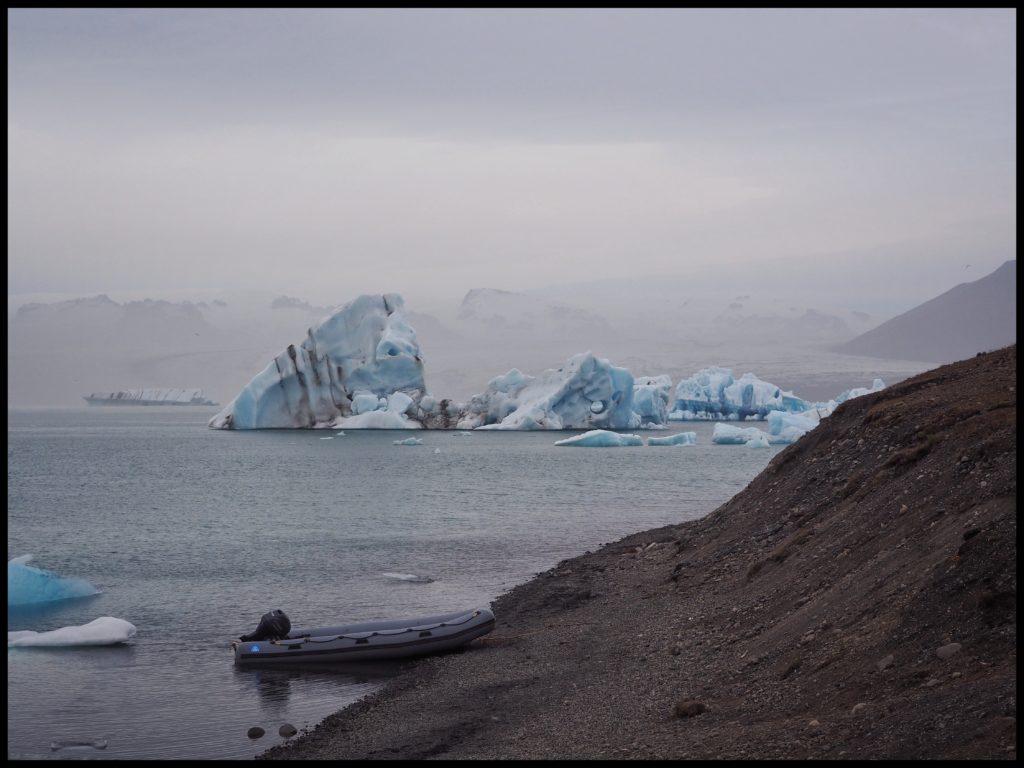 Icebergs glacier and boat