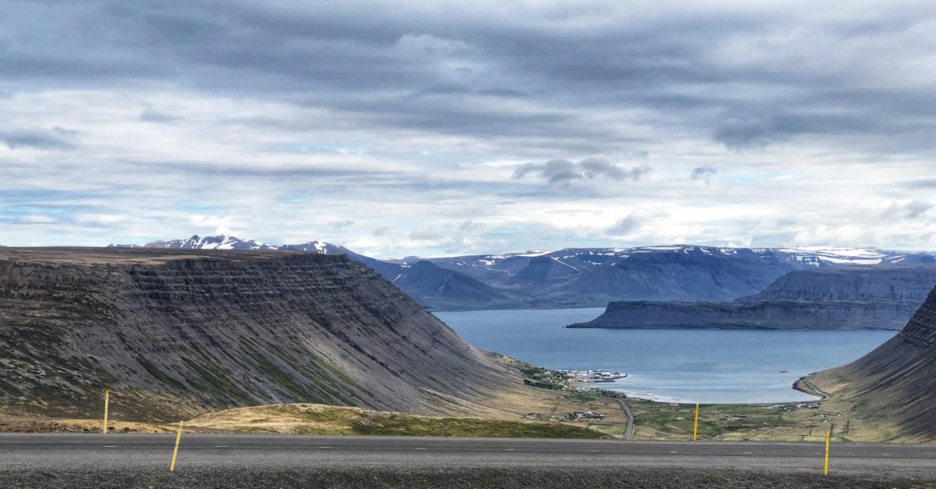 Town at bottom of mountains in Iceland