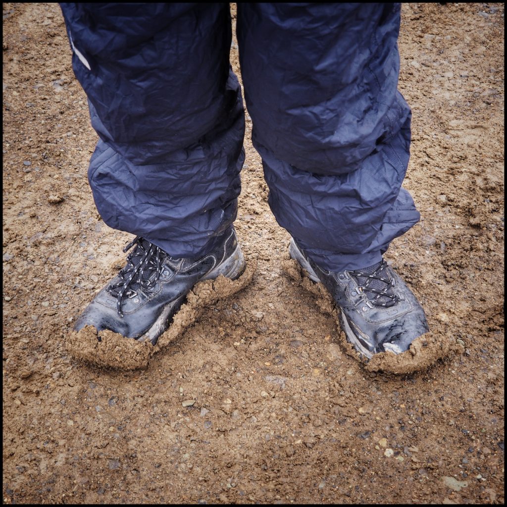 Boots covered in mud